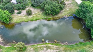 Pond, River Access, and Playground at Riverbend on the Frio River