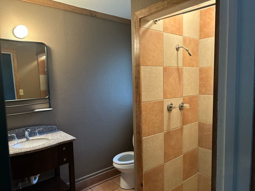 A bathroom with a toilet and sink in it